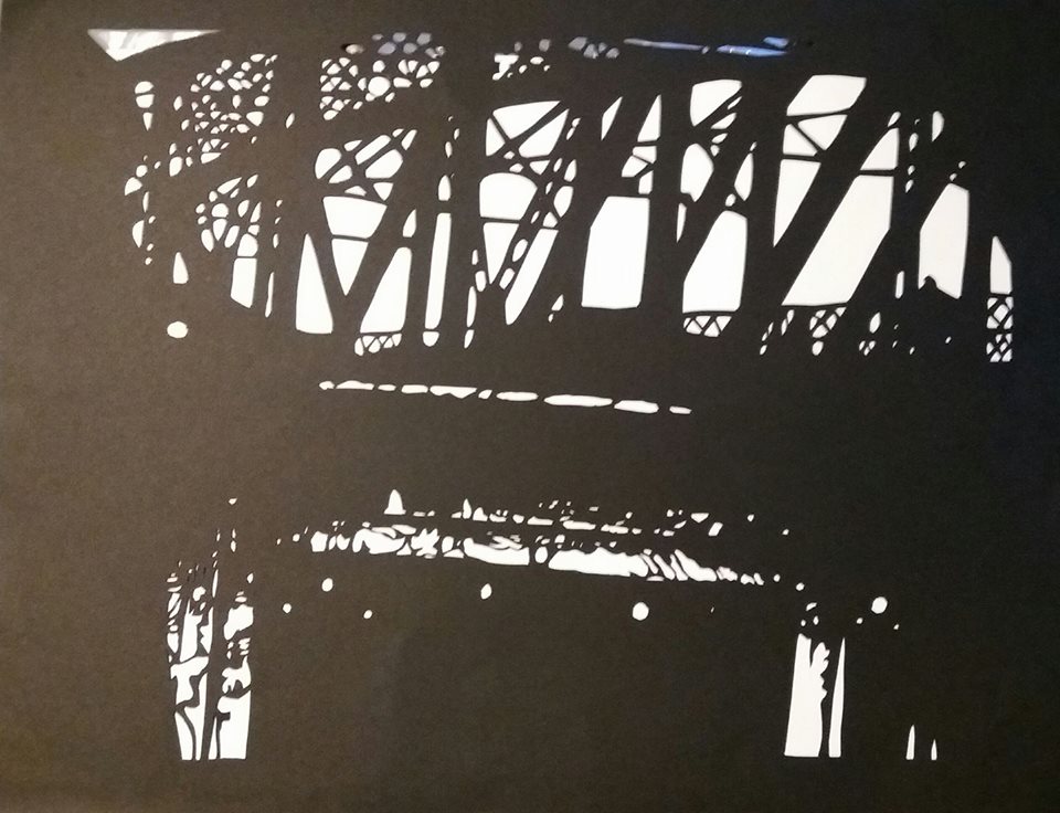 Cut out paper art black and white cityscape of bridge in Portland Oregon