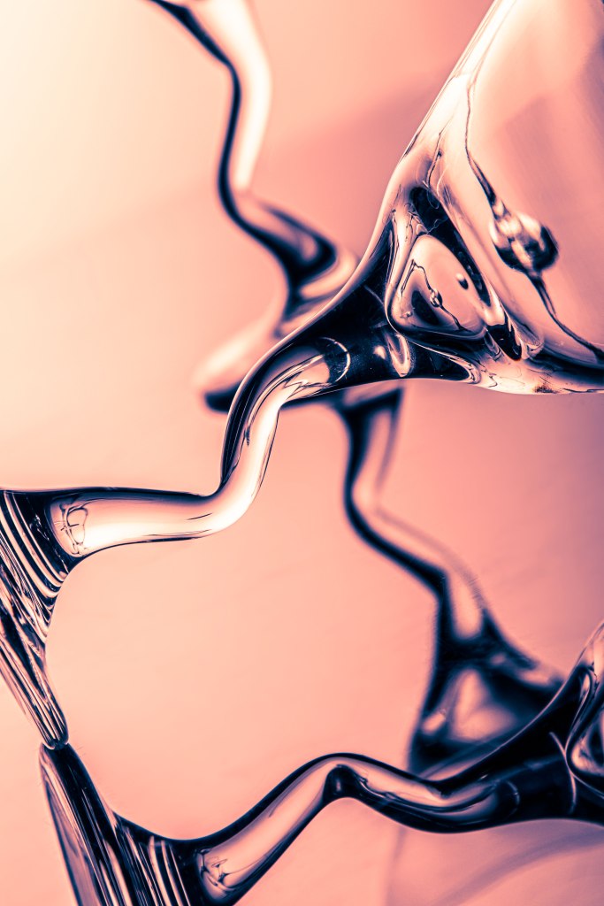 art photography, peach light behind martini glasses, abstract art