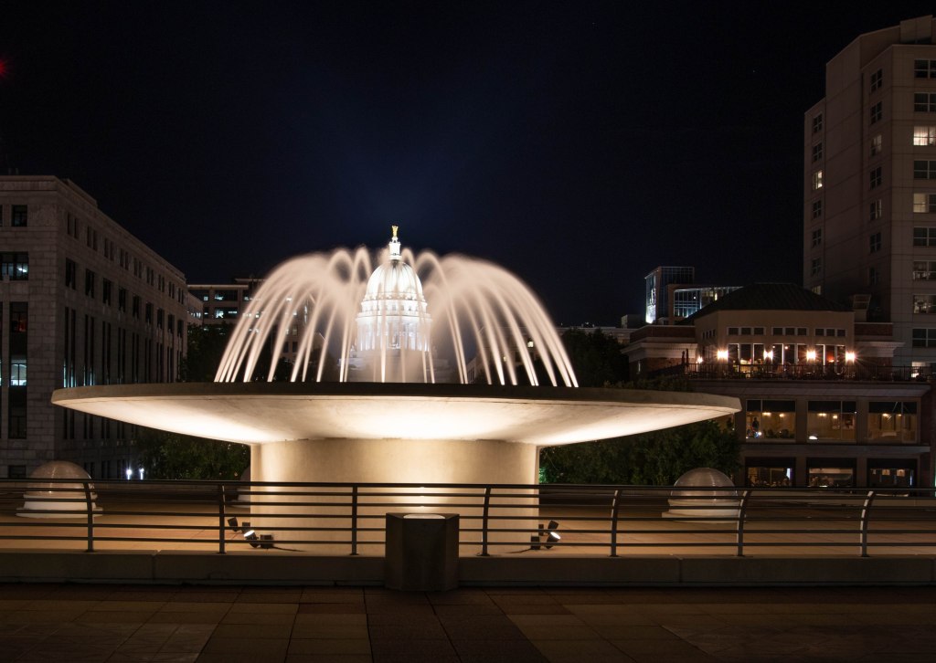 Monona Terrace fountain and State Capitol building, Madison, Wisconsin, USA